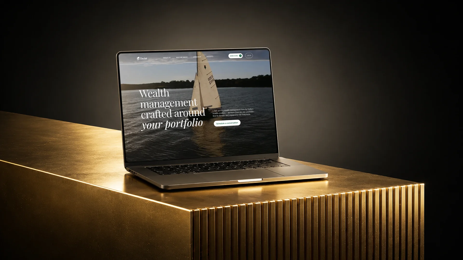 Daulat wealth-management website displayed on a laptop, with sailing imagery and editorial typography.